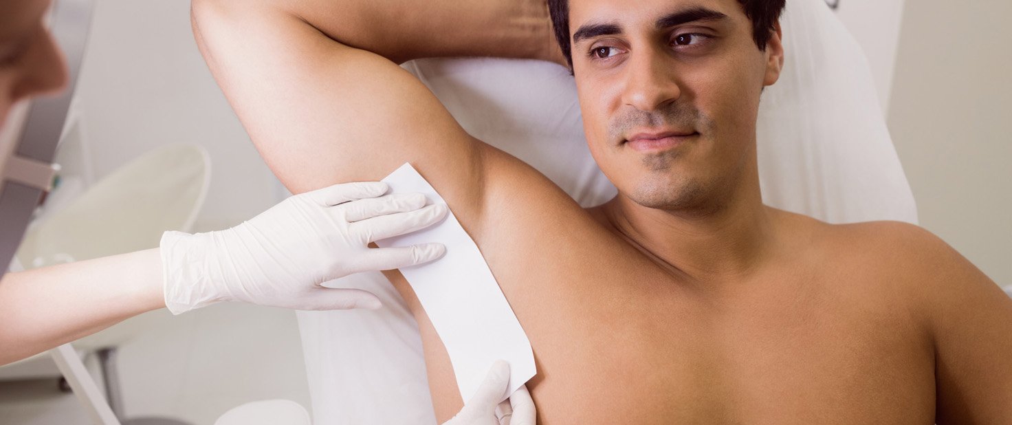 Waxing hair removal for men