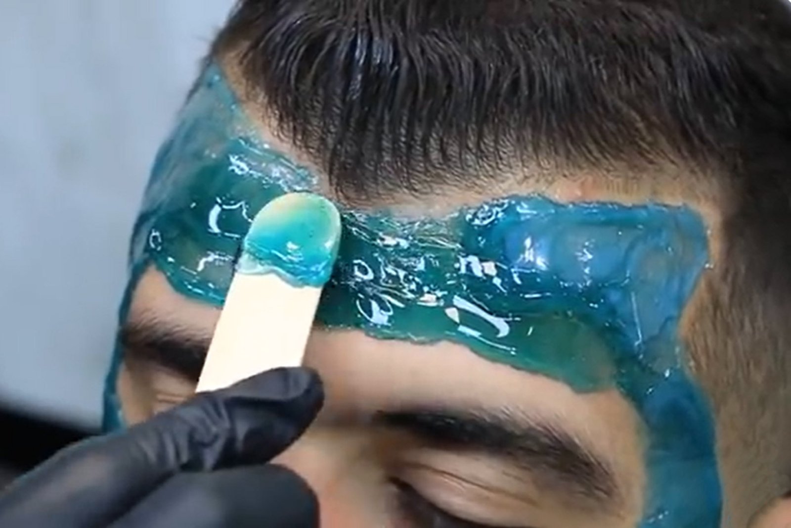 forehead waxing for man